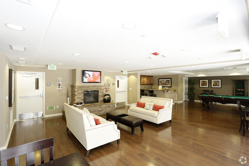 a living room with a couch and a table