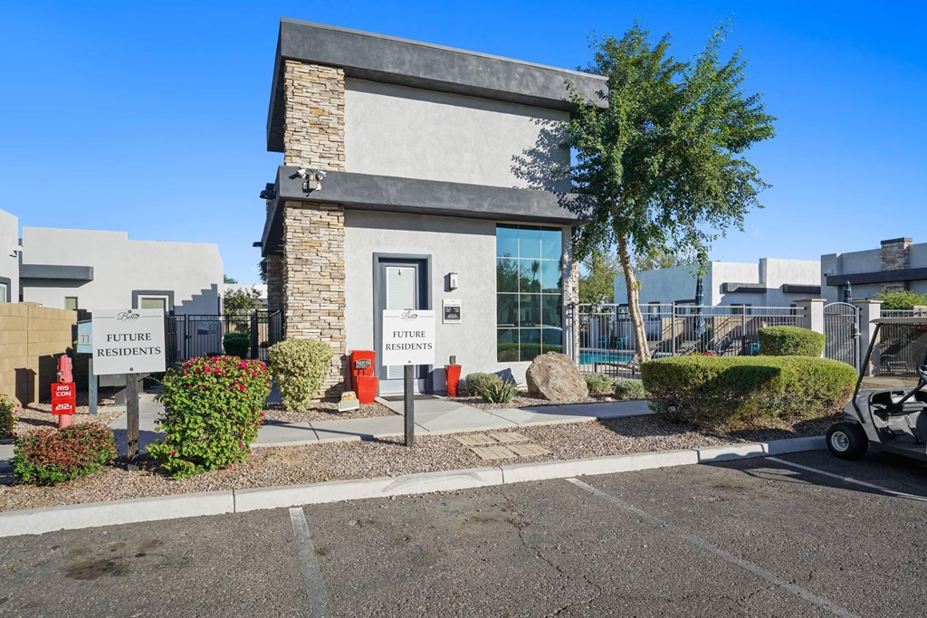 A building with a sign that says "Future Residents" in front of it.