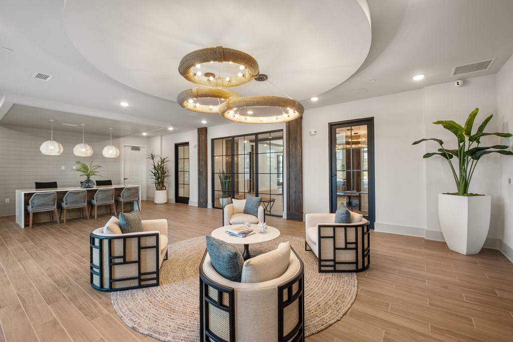 the preserve at ballantyne commons clubhouse with couches and chairs