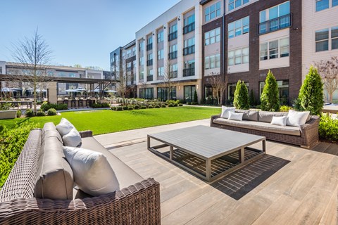 Landscaped Outdoor Space with Fireplace, Smart TV, Grilling Stations, Outdoor Dining, Ping Pong and Bag Toss