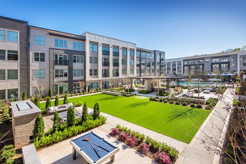 Landscaped Outdoor Space with Fireplace, Smart TV, Grilling Stations, Outdoor Dining, Ping Pong and Bag Toss