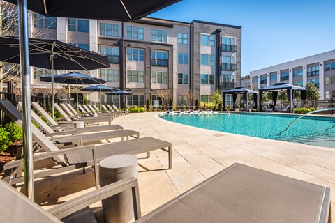 Resort-Style Pool Courtyard with Pool-Side Cabanas