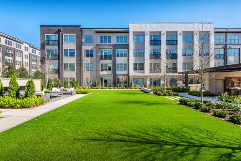 Landscaped Outdoor Space with Fireplace, Smart TV, Grilling Stations, Outdoor Dining, Ping Pong and Bag Toss