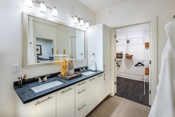 Dual-Vanity Countertops, Walk-In Showers & Linen Closets