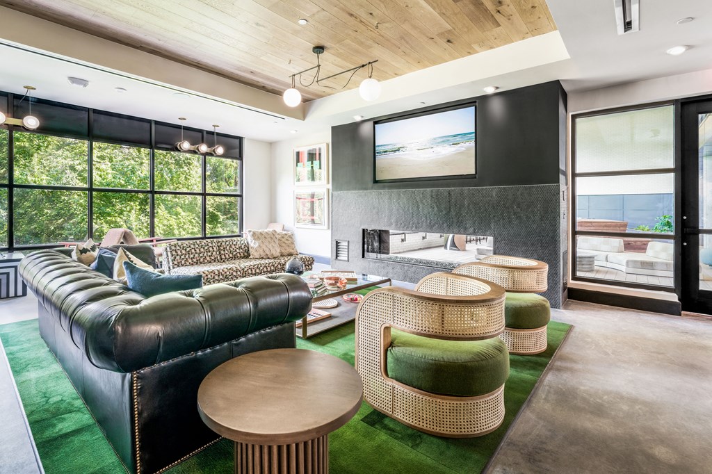 clubroom with firepit and flatscreen tv