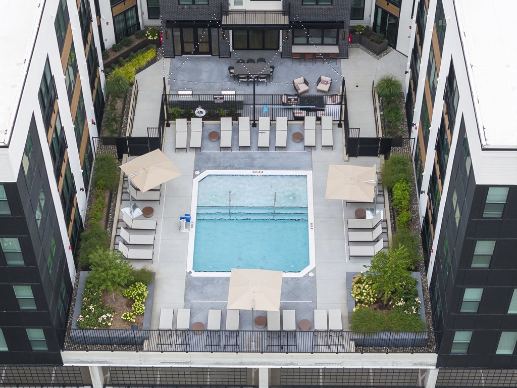 an overhead view of a pool in the middle of a building