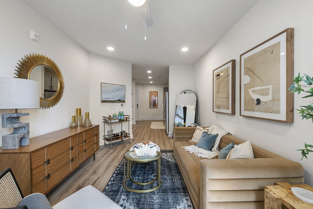 a living room with a couch and a table