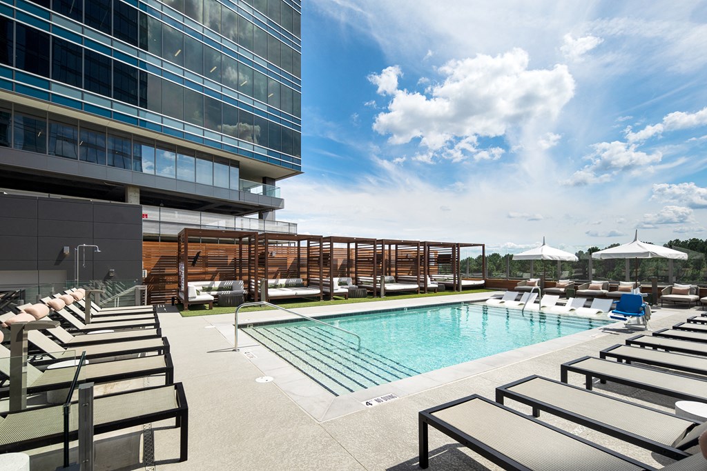 Saltwater pool featuring private cabanas