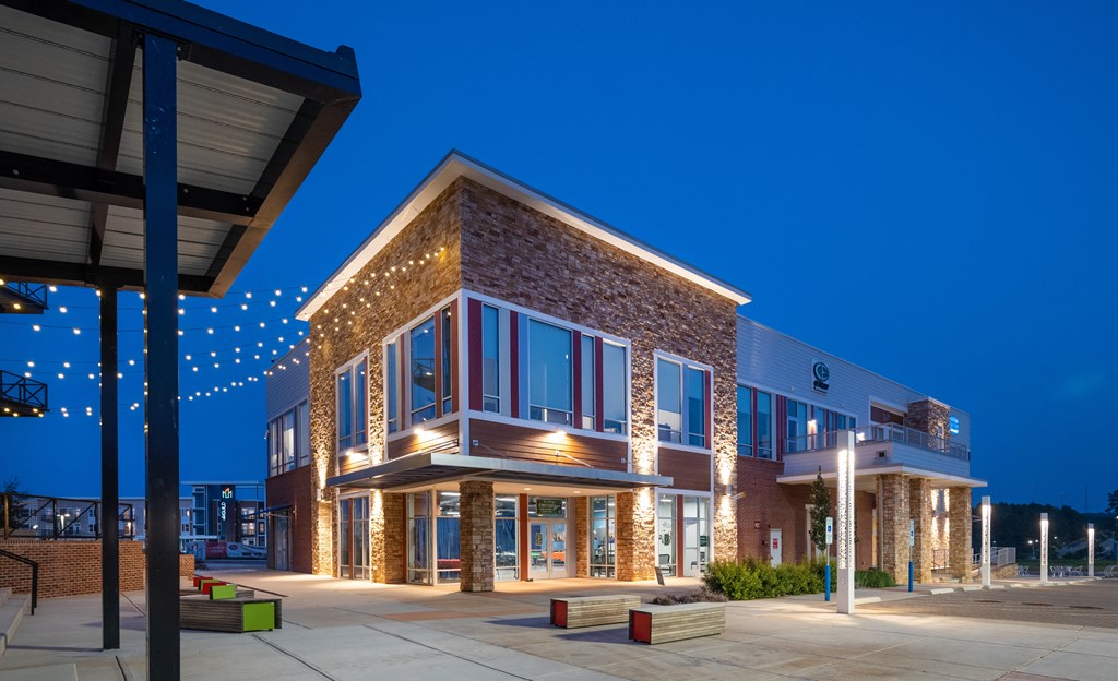 a large brick building at night