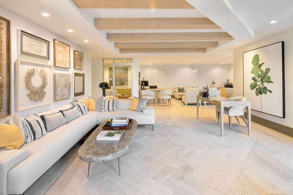 a living room with a couch and a table