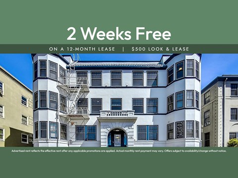 A building with a sign offering a 2 weeks free on a 12-month lease.