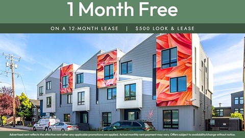 A modern apartment complex offers a free first month on a 12-month lease.