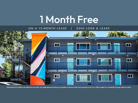 A building with a sign that says "1 Month Free on a 12-month lease | $500 look & lease".