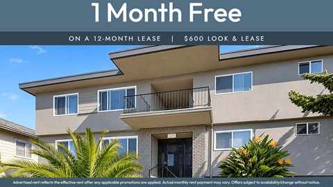 A building with a sign offering a free month on a 12-month lease.