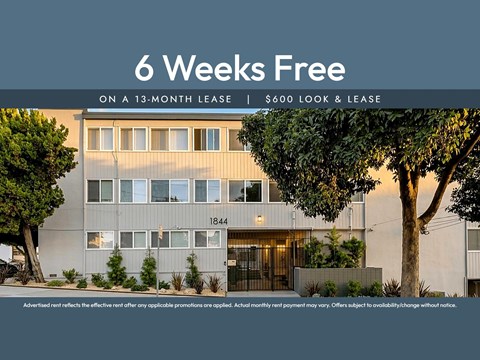 A building with a sign that says "6 Weeks Free on a 13-month lease | $600 look & lease".