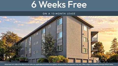 A building with the text "6 Weeks Free on a 13-month lease" displayed on it.
