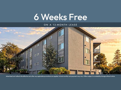 A building with the text "6 Weeks Free on a 13-month lease" in front of it.
