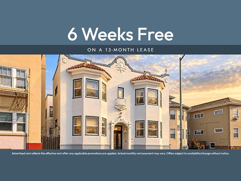 A building with a sign that says "6 Weeks Free on a 13-month lease".