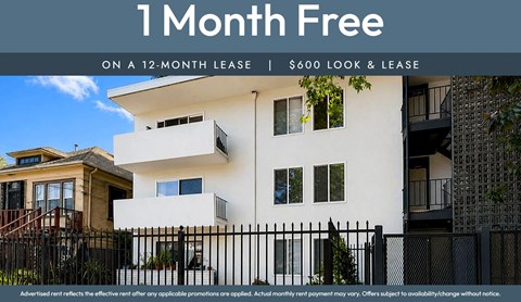 A white building with a black fence and a sign that says "1 Month Free on a 12-Month Lease | $600 Look & Lease".