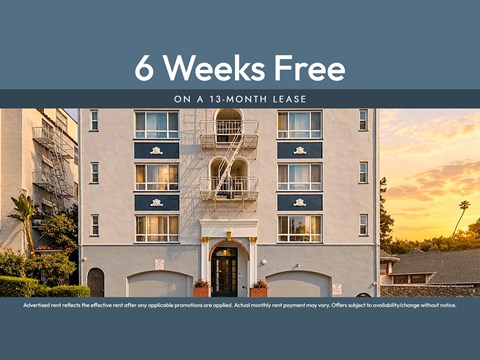 A building with a sign that says "6 Weeks Free on a 13-month lease".