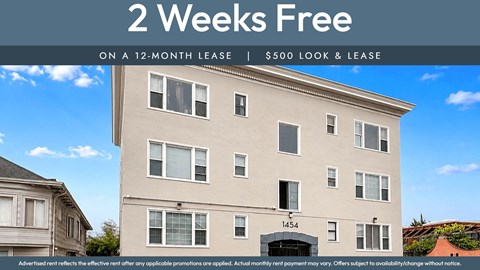 A building with the number 1454 on it and a sign that says "2 Weeks Free on a 12-month lease | $500 look & lease".