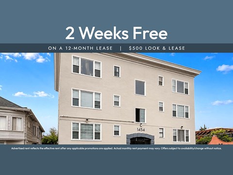 A building with a sign that says "2 Weeks Free on a 12-month lease | $500 look & lease".