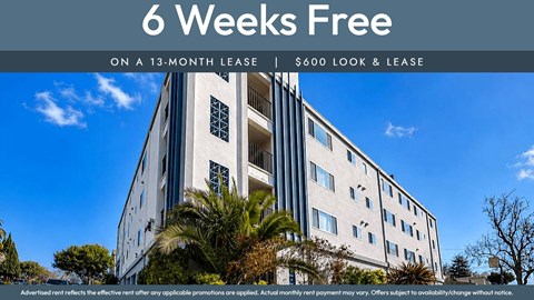 A building with a sign that says "6 Weeks Free on a 13-month lease | $600 look & lease".