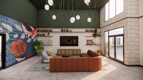 A living room with a brown sofa and a fireplace.