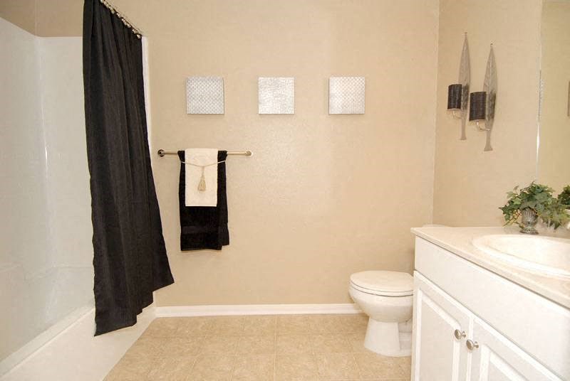 Bathroom with bathtub, white toilet and  sink