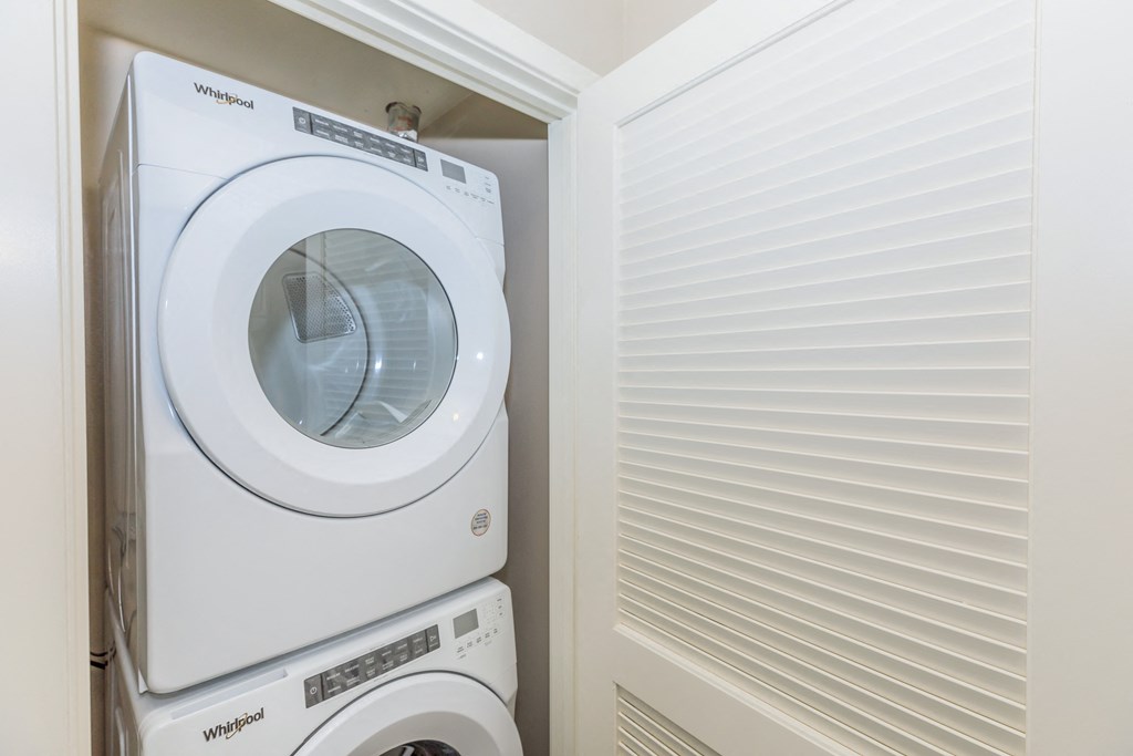 a laundry room with a washing machine and a dryer