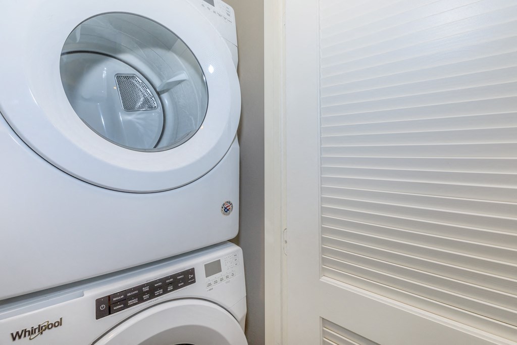 a washer and dryer in the laundry room of a house