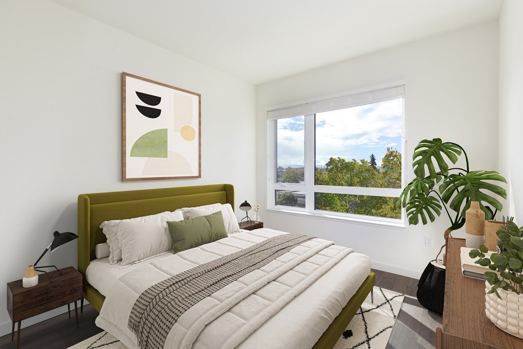 Staged bedroom photo with windows