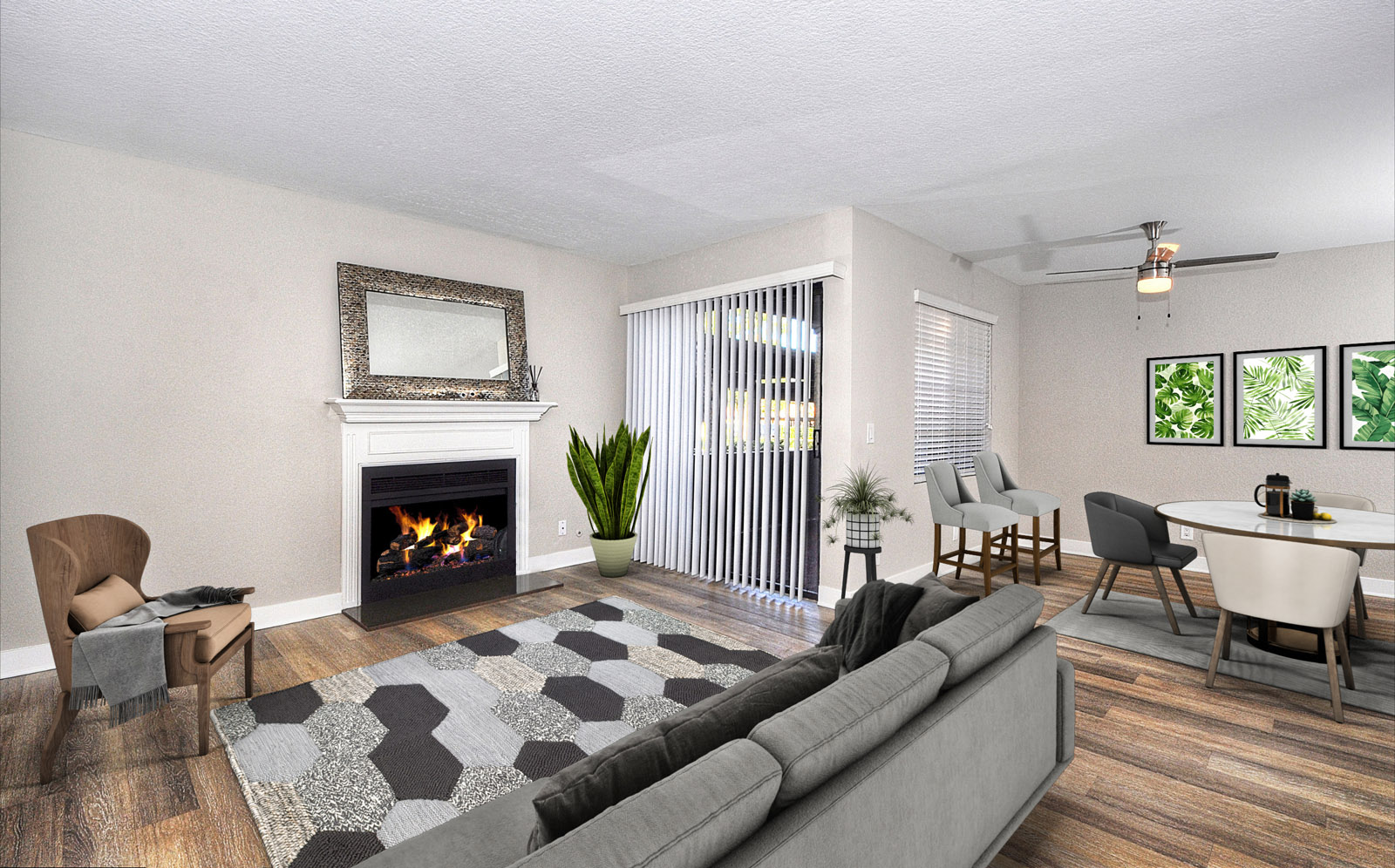 Living area with fireplace and sliding glass doors to balcony
