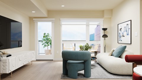 A living room with a blue chair and a white couch.