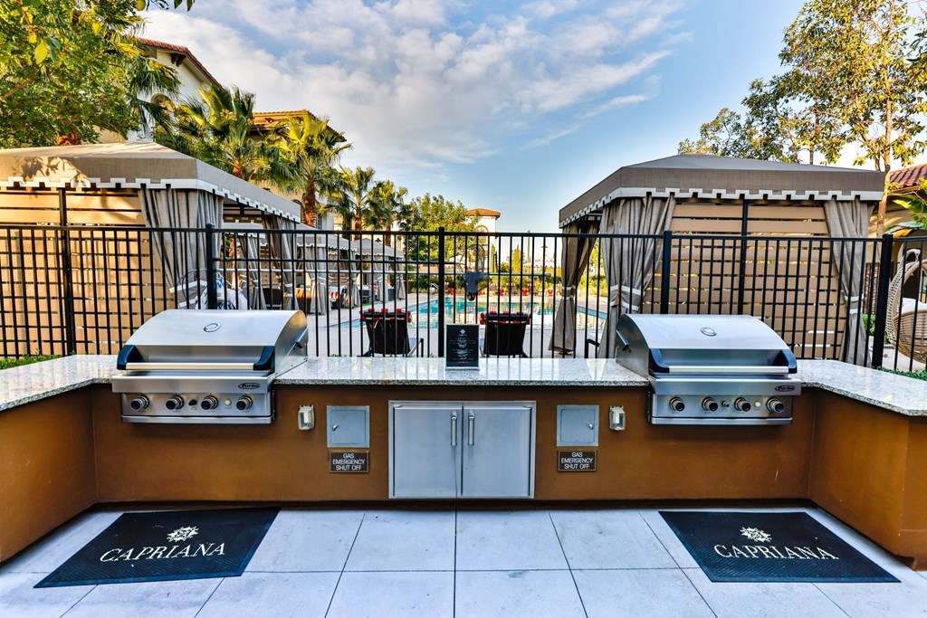 Chino Hills Apartments - Capriana at Chino Hills - Community Grill with Poolside View