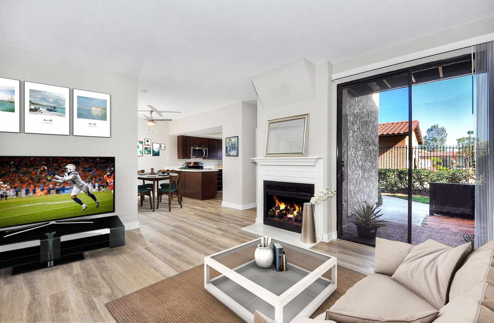 a living room with a fireplace and a television