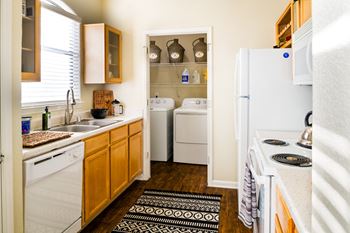 furnished kitchen and laundry room