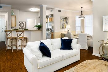 living room with Pass Through Kitchen Bars