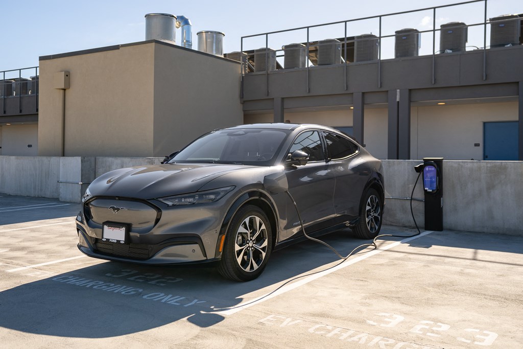 a 2020 fusion plugged in to a charging station