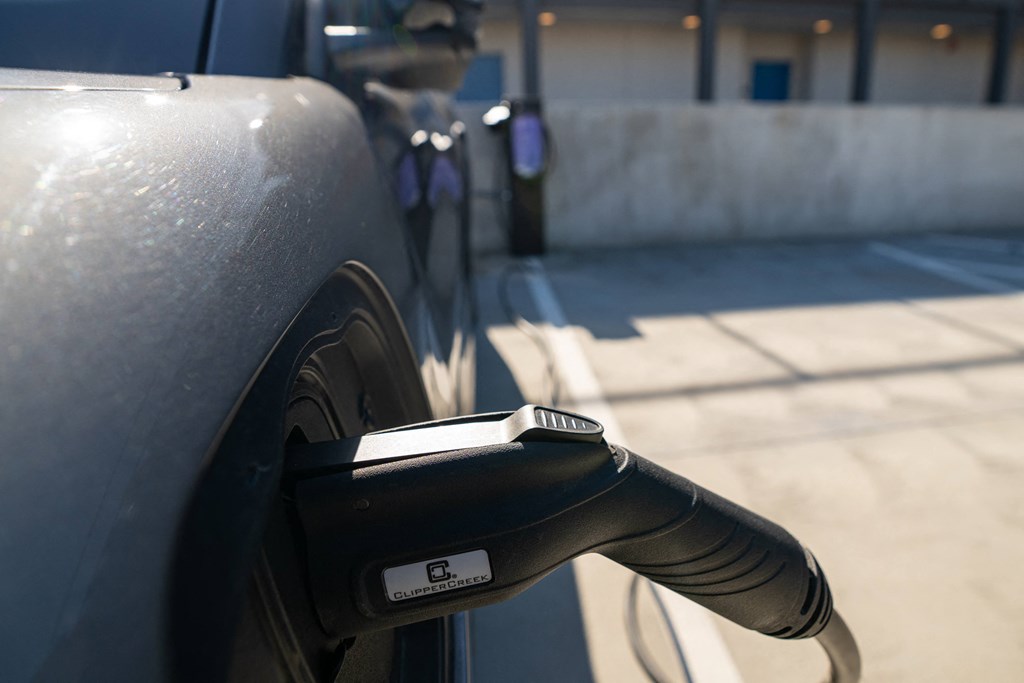 a close up of a charging station on the side of a car