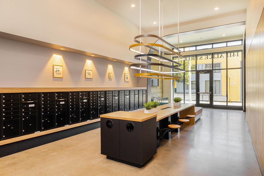a large wine cellar with a long table and chairs and a spiral light above it