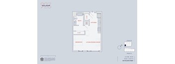 A floor plan of an apartment with a bedroom, living/dining room, kitchen, and bathroom.