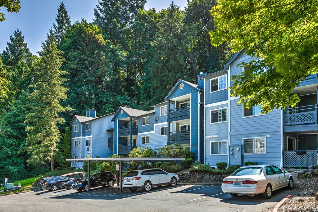 Building exterior with carport and parking at Lakemont Orchard, Issaquah, 98027