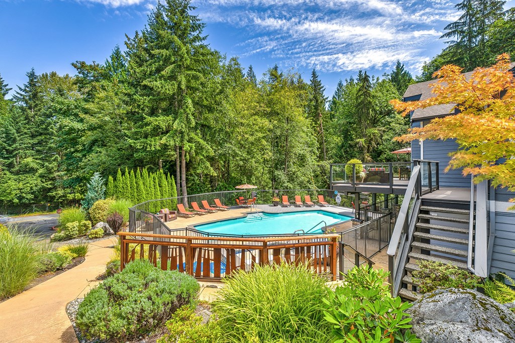 Apartments for Rent in Issaquah WA - Lakemont Orchard - Gated Pool Surrounded by Lounge Seating