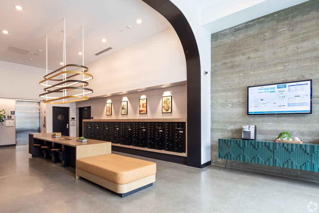 the lobby or reception area of a hotel with a reception desk and a wine cellar