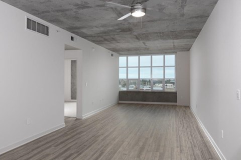 Bedroom with large windows at Aqua Via Apartments, California, 94607