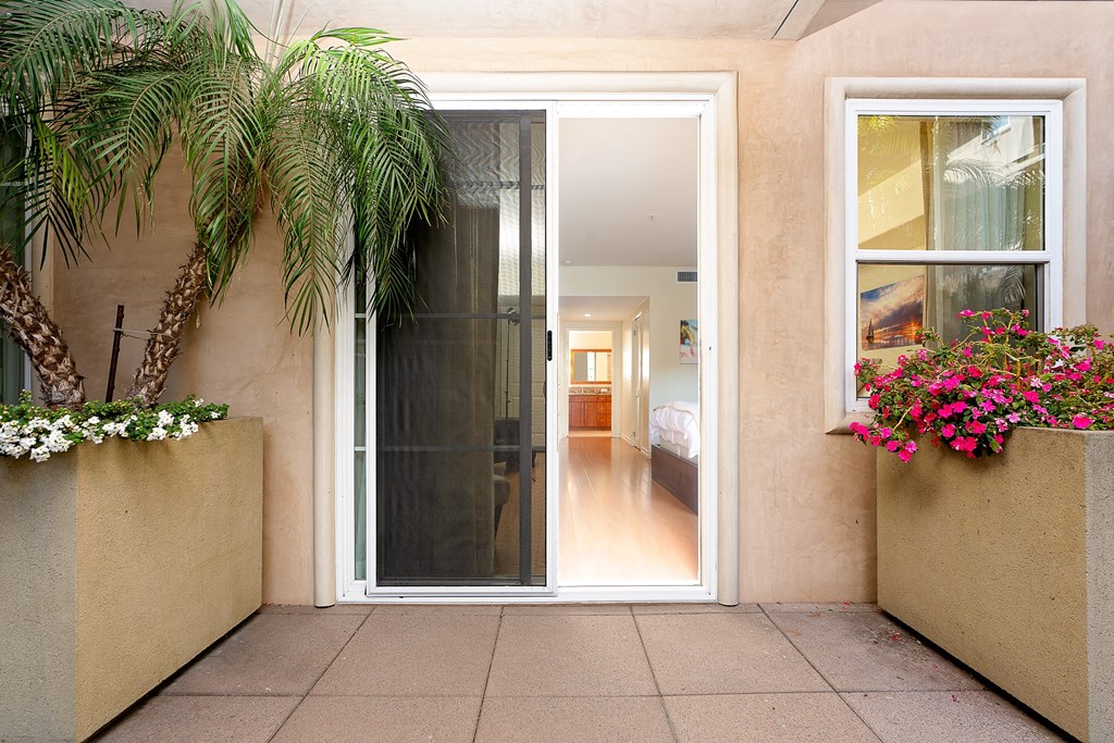 a view into the bedroom from the patio