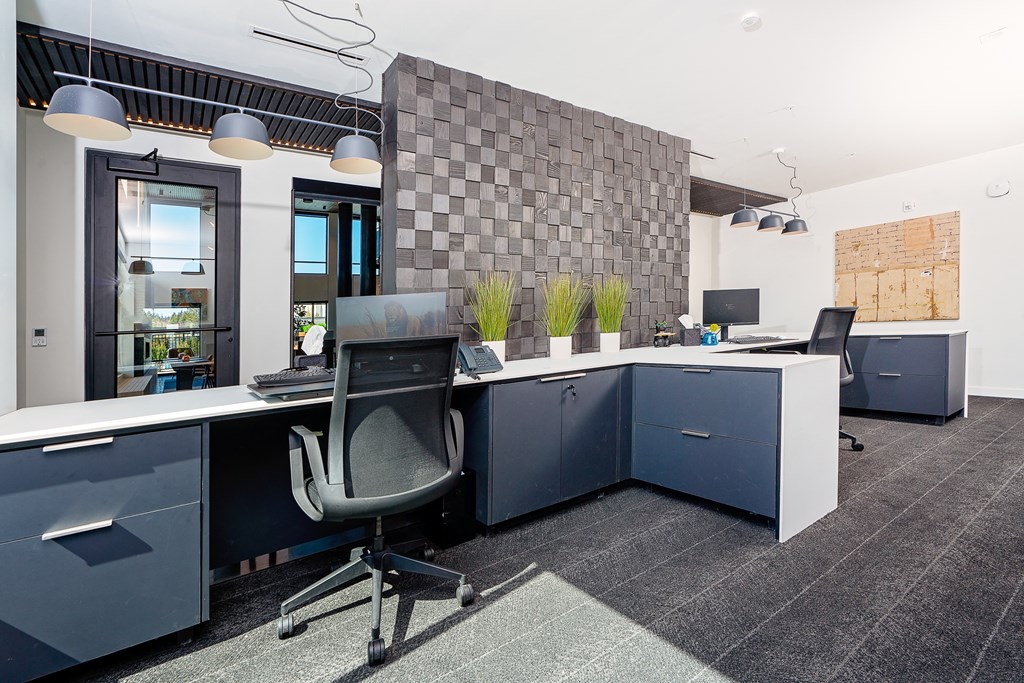 an open office space with desks and chairs