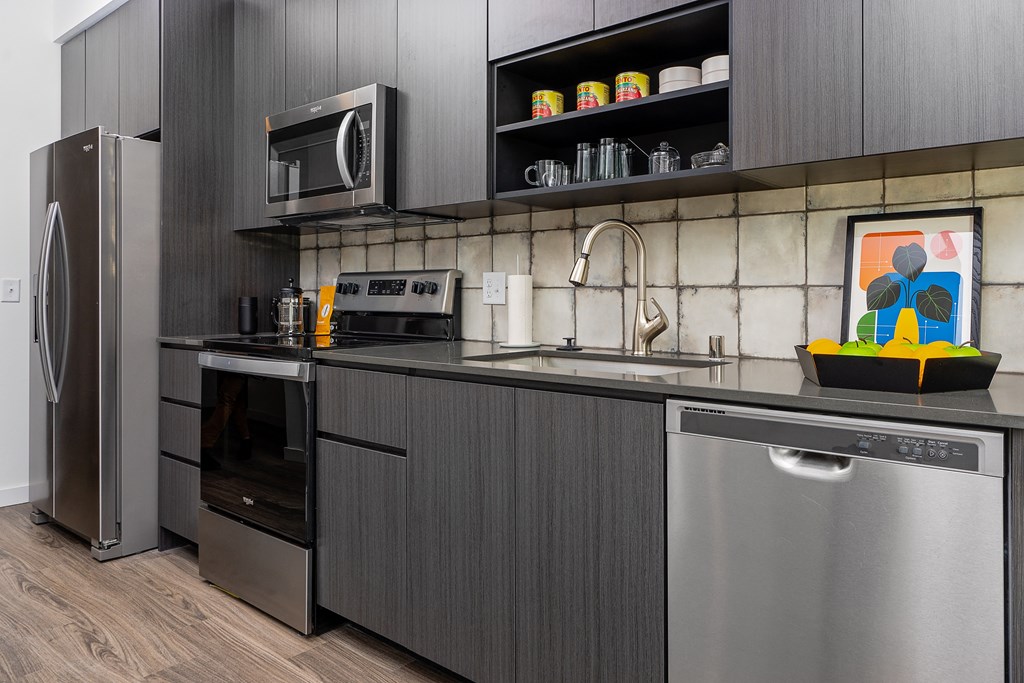 a kitchen with a sink and a dishwasher