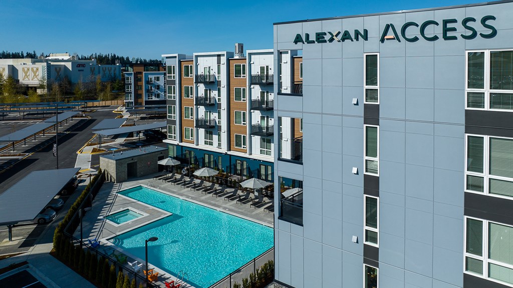 an aerial view of the alexandra access building with a swimming pool
